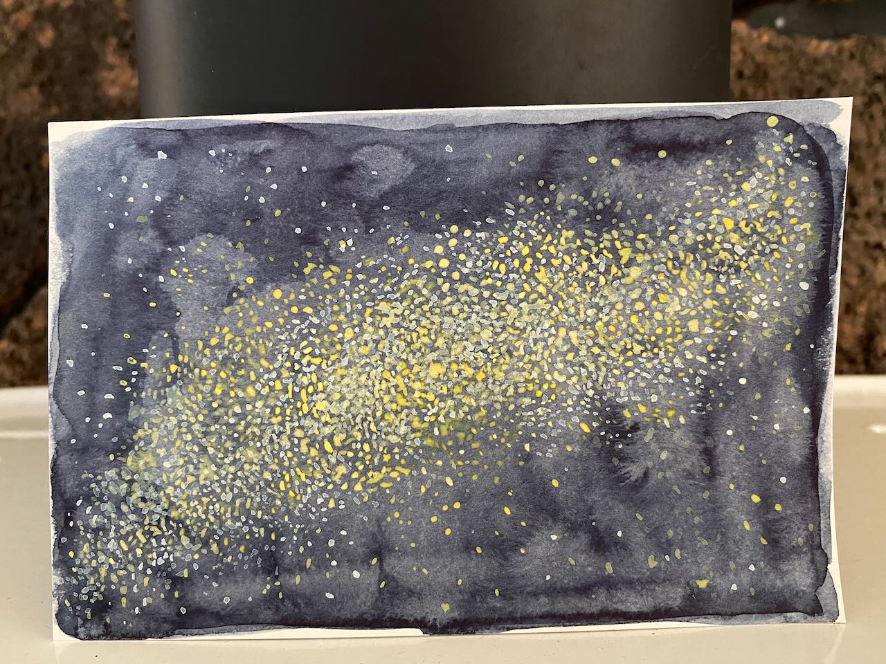 Watercolor painting of a galaxy by Laurel Hunter