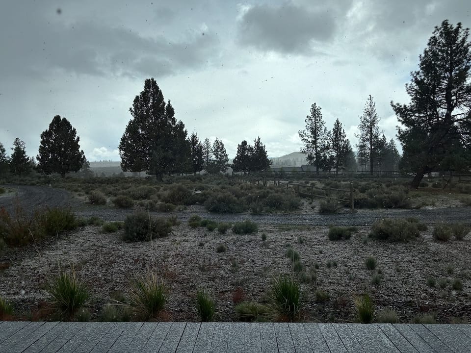 Hail falling on a rural area outside of Bend, OR