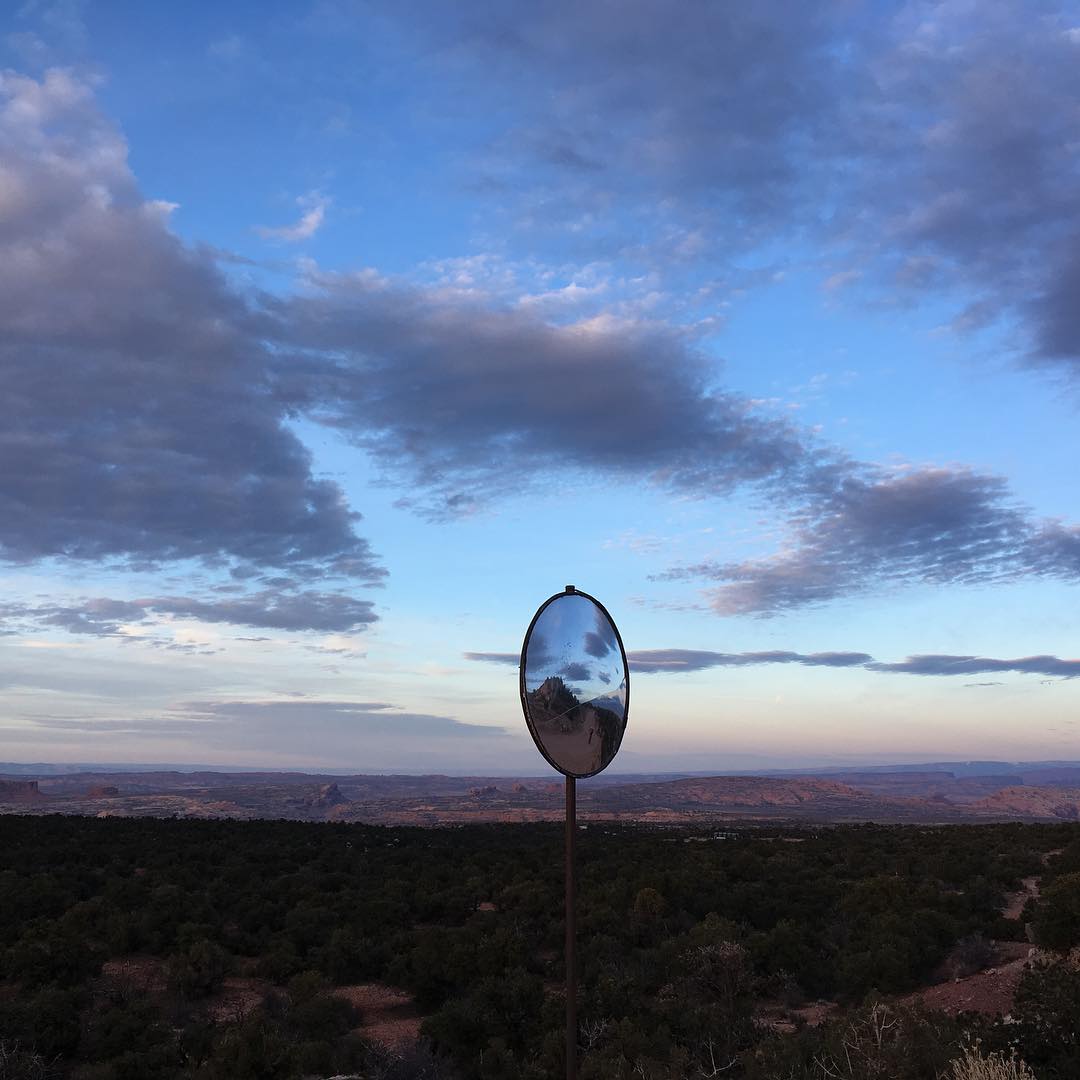 Racing the sun back to camp, but there is always time to take a photo of a bubble mirror in the middle of the desert.