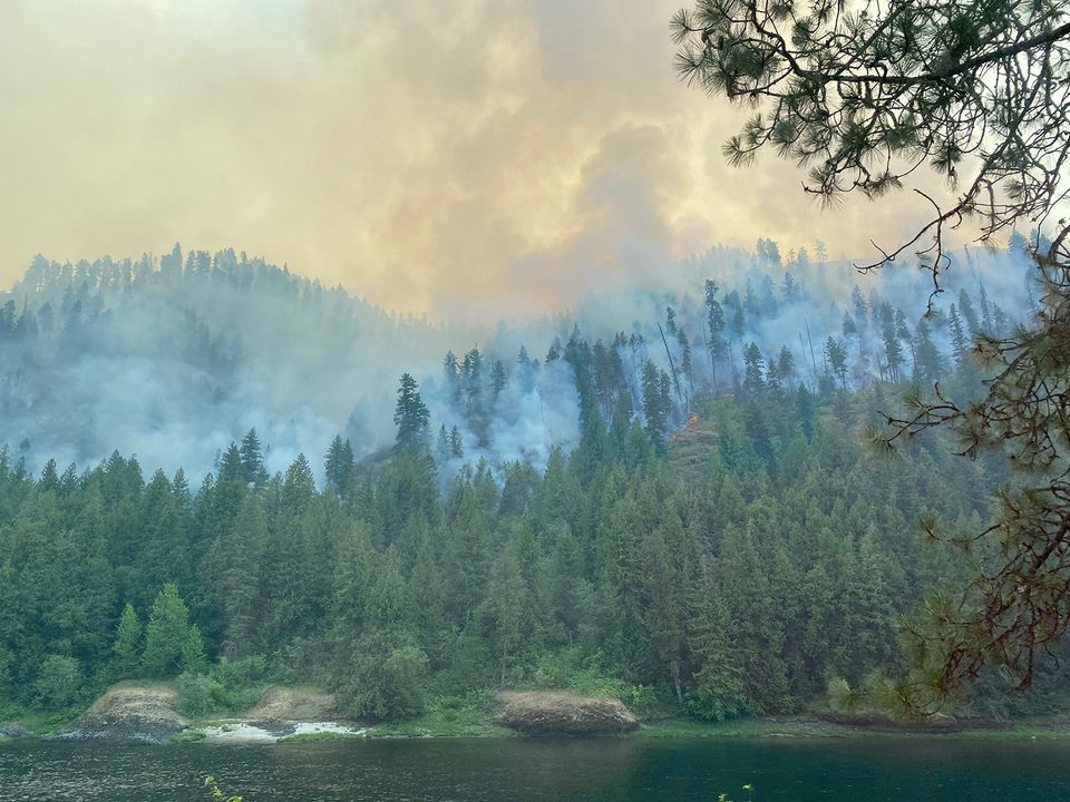 Wildfire across the Lochsa River, Idaho.